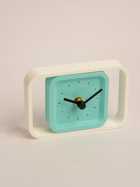 LayerStory SpinFrame Rotating Desk Clock with teal dial and white frame