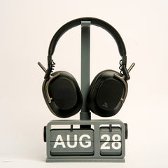 Close-up of FlipDate headphone stand extension with retro calendar base