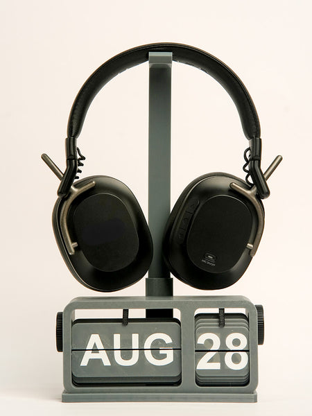 Close-up of FlipDate headphone stand extension with retro calendar base