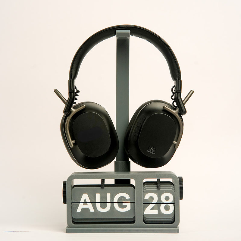 Close-up of FlipDate headphone stand extension with retro calendar base