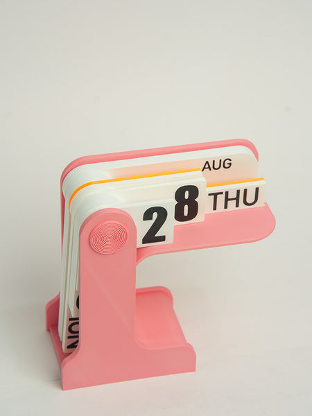 Manual flip date display desk calendar with bold black and white numbers