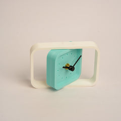 Modern minimalist rotating desk clock for workspace or home decor