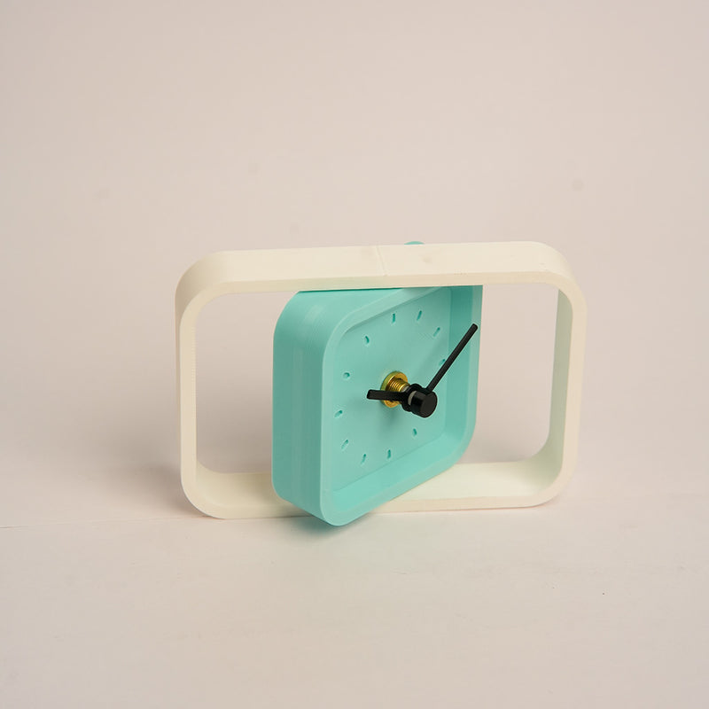 Modern minimalist rotating desk clock for workspace or home decor