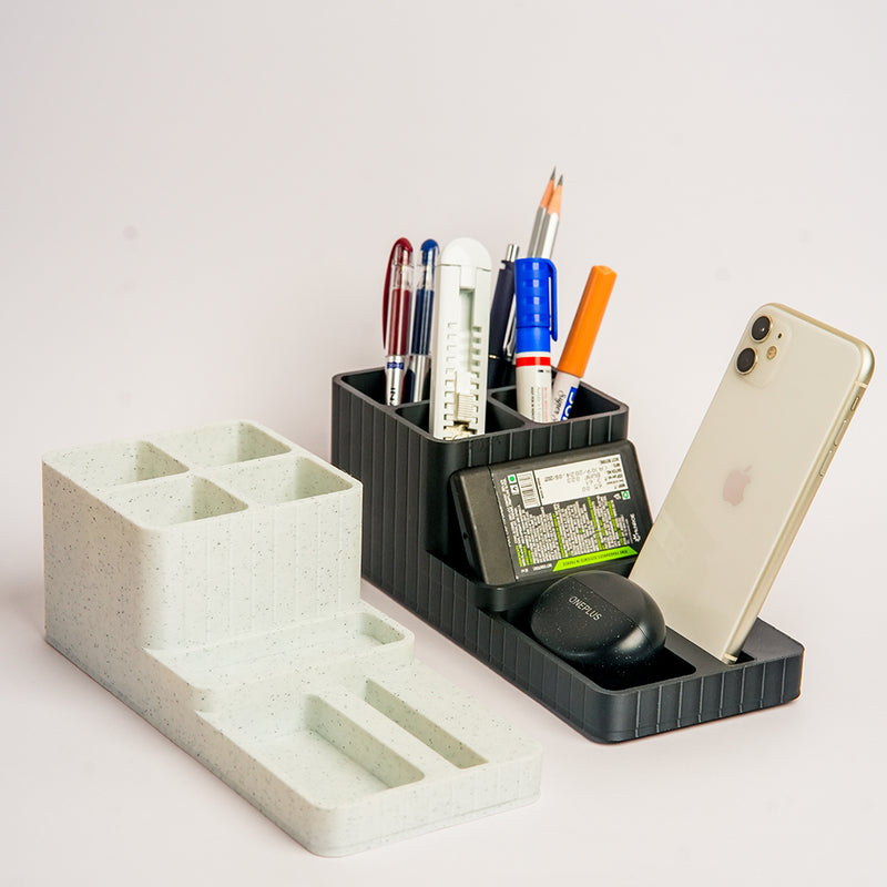 Desk organizer with stationery items on a white background