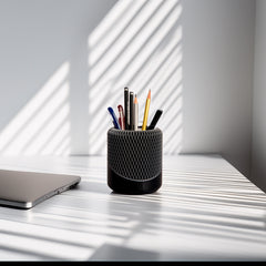 NeoMesh desk organizer holding pens and stationery on a workspace