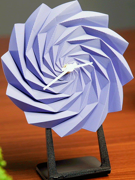 LayerStory Twist Bloom Desk Clock in purple with geometric swirl design